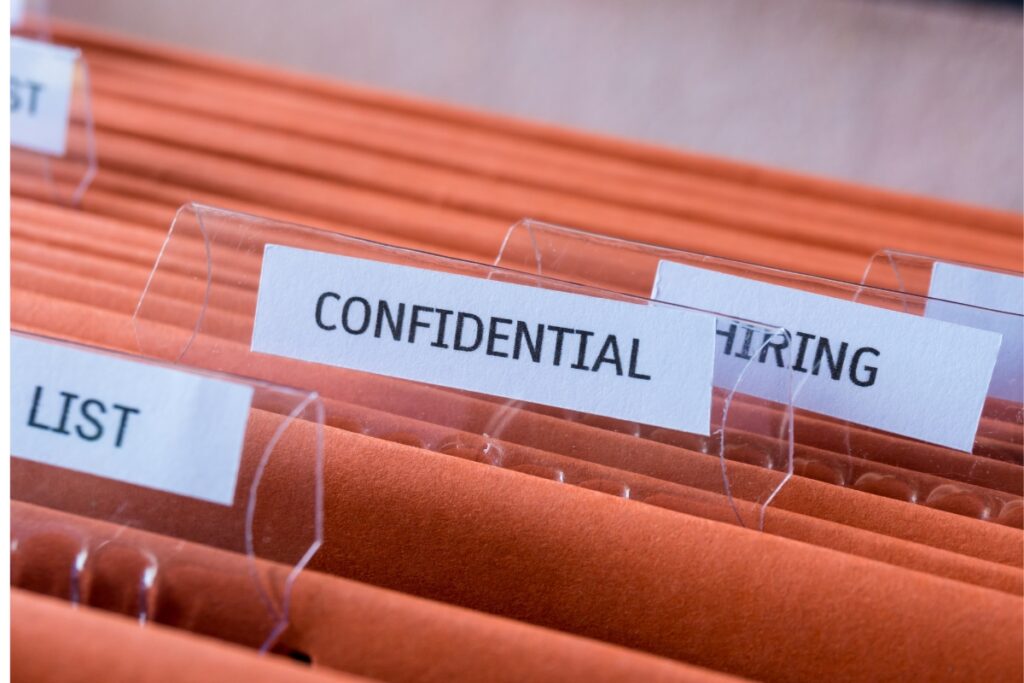 A confidential hiring file folder.