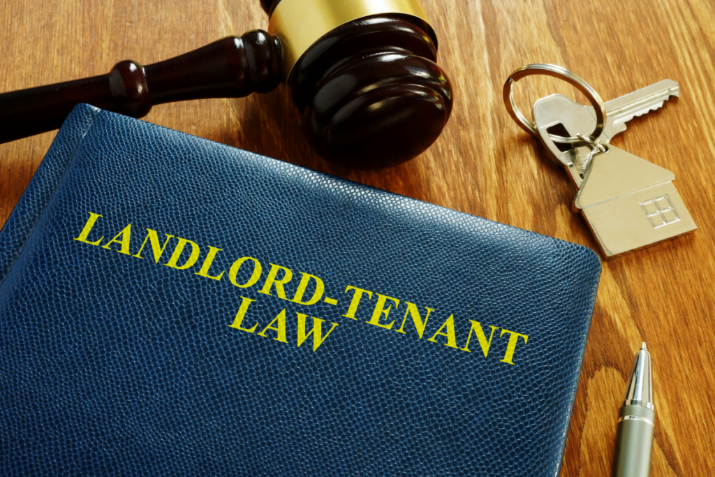 A book on landlord-tenant law featuring tenant screening services.